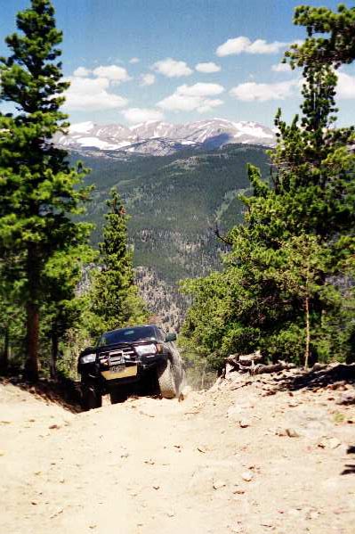 Scott pilots his 4 Runner to the top of the first hill