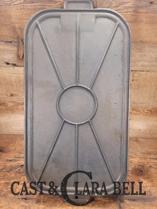 beautiful-1950-wagner-ware-17-inch-cast-iron-long-griddle-ready-to-make-pancakes-sc24-711.png