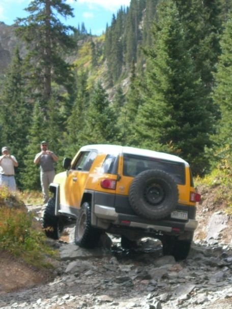 Brandon goes up creek.JPG