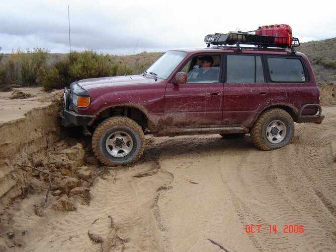 Outlaws Run 2006 - Convert Conquers five foot bank 1.JPG