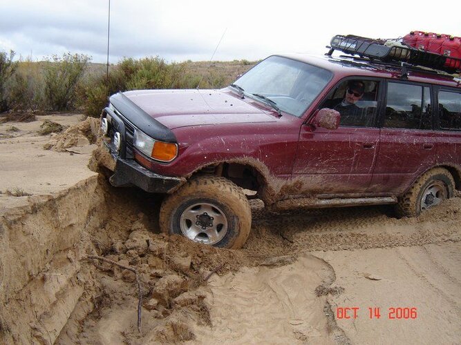 Outlaws Run 2006 - Convert Conquers five foot bank 2.jpg