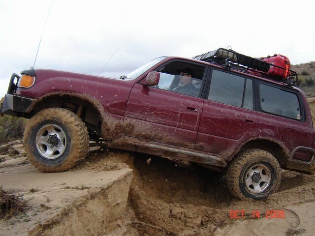 Outlaws Run 2006 - Convert Conquers five foot bank 3.jpg